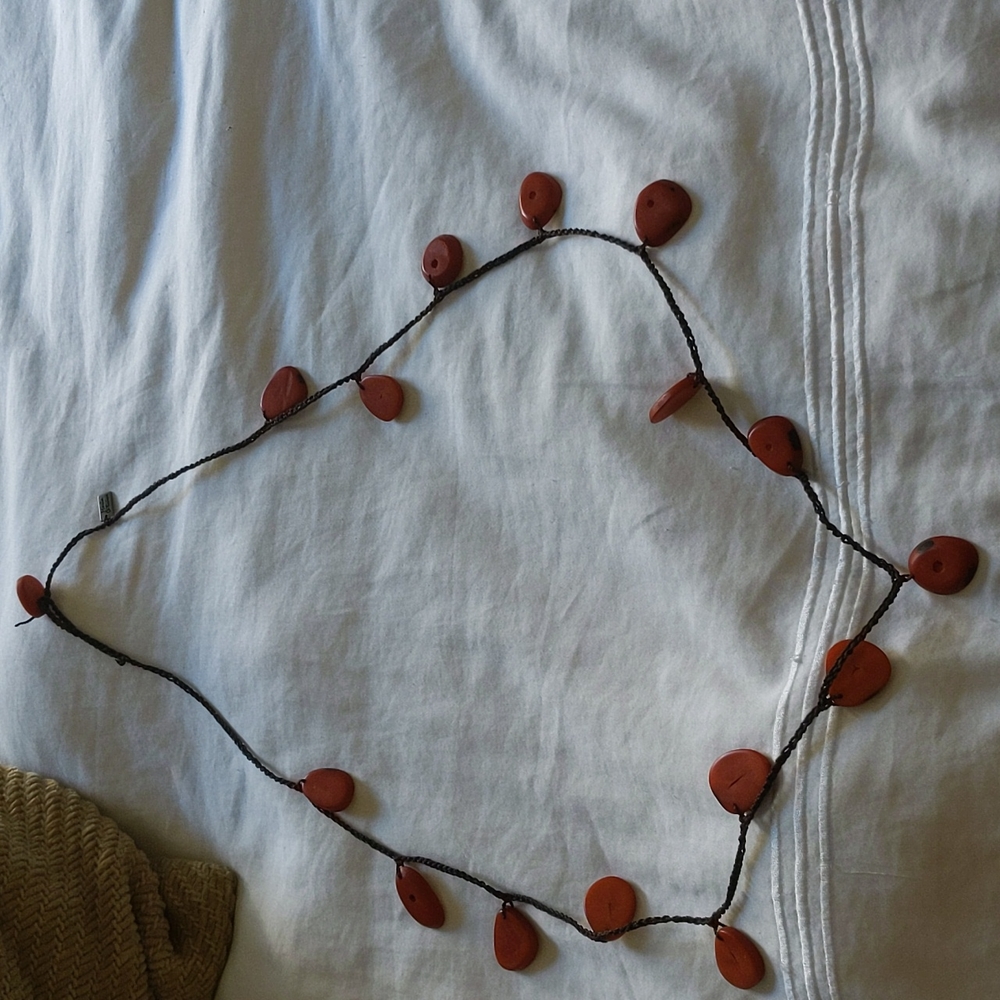 Orange beaded long statement necklace